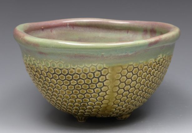 handmade pottery bowl with honeycomb texture
