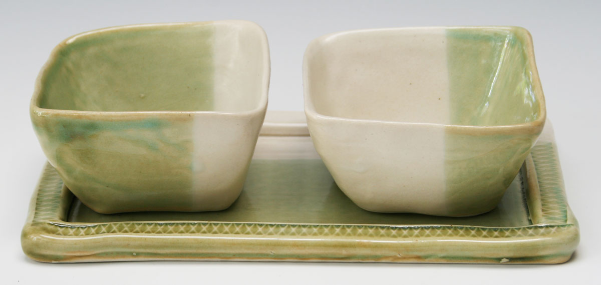 ceramic tray and two bowls made during a corporate team-building pottery workshop